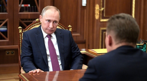 Путин поручил разработать поправки в законы для размещения токенов